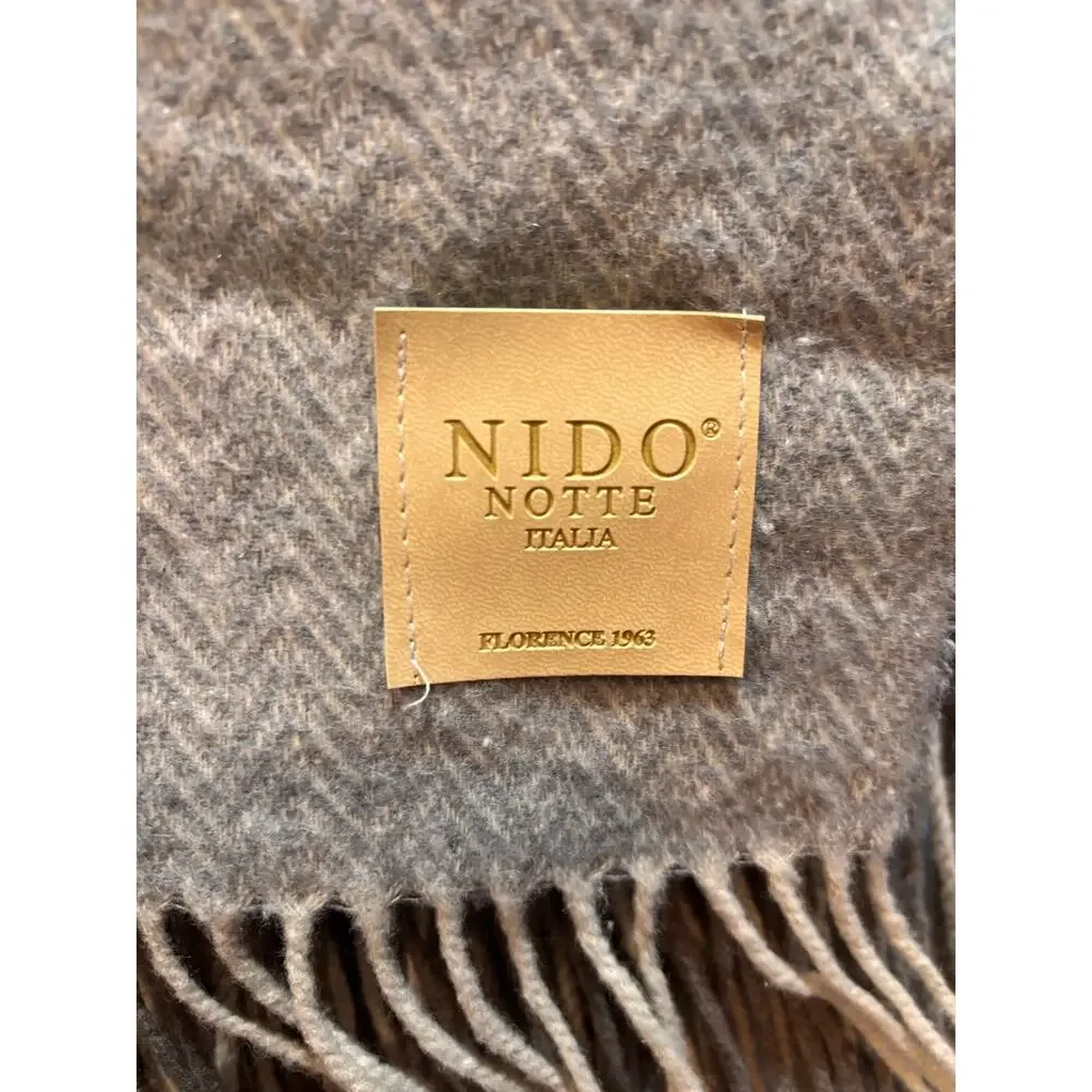 Nido Notte Italia throw blanket gray and cream herringbone pattern with fringe